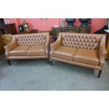 A pair of mahogany and brown leather buttoned settees