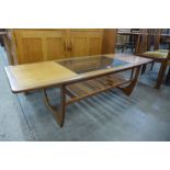 A G-Plan Fresco teak and glass topped coffee table