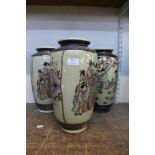 A pair of oriental satsuma porcelain vases and one other