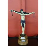 An Art Deco style painted bronze figure of an exotic female dancer, on marble socle