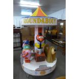A late 20th Century coin operated child's The Magic Roundabout ride