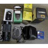 Two camera lenses; Soligor 135mm f:2-8 and Sirius 80-200mm f:3.9, a Teleplus MC4 2x tele