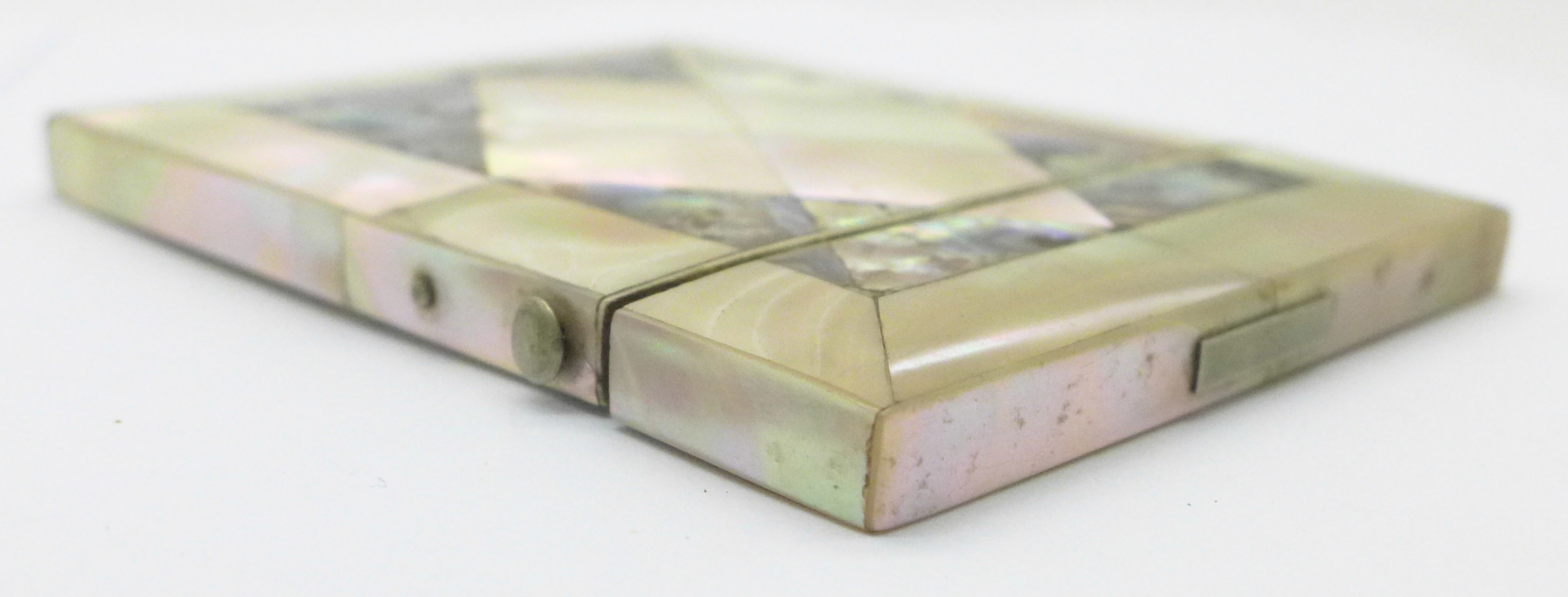 An abalone mother of pearl card case, 78mm x 101mm, (hinge strained, fastener requires repair) - Image 5 of 5