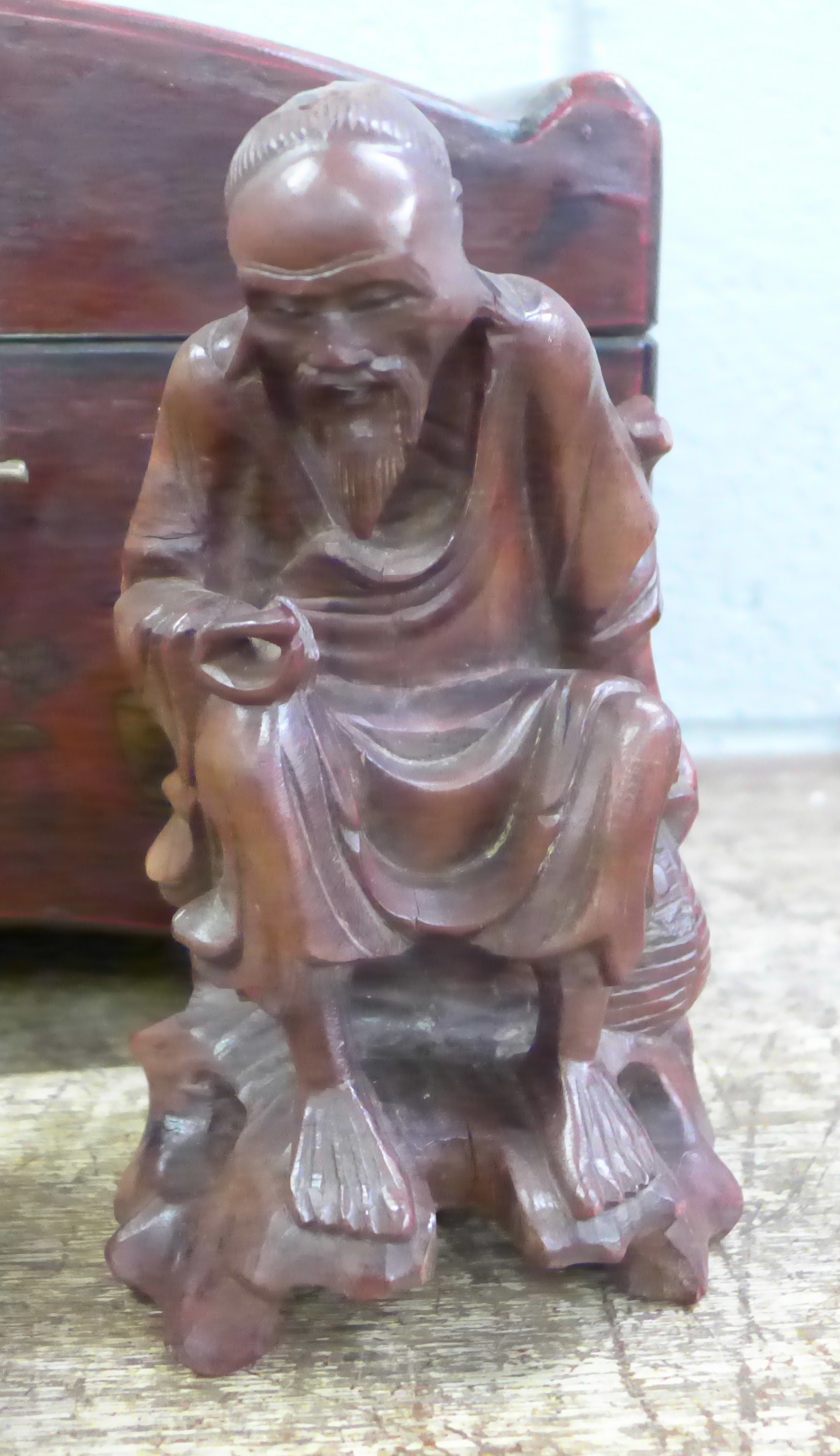 A Chinese casket, a wooden box and a carved figure of an elder - Image 2 of 4