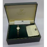 A lady's 9ct gold wristwatch by Sovereign, with box, weight with movement 8.3g