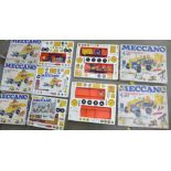 Three Meccano 3 boxed sets and two Meccano 4 boxed sets