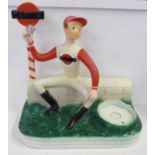 A Martini advertising stand, seated jockey by Novita, 43cm (repainted and possibly restored)