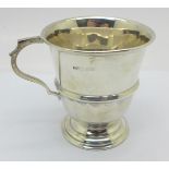 A silver cup, 61g