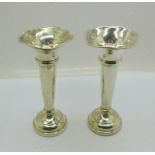 A pair of silver vases with Birmingham marks, 10.5cm