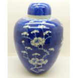 A 19th Century blue and white prunus decorated ginger jar and cover, 21cm