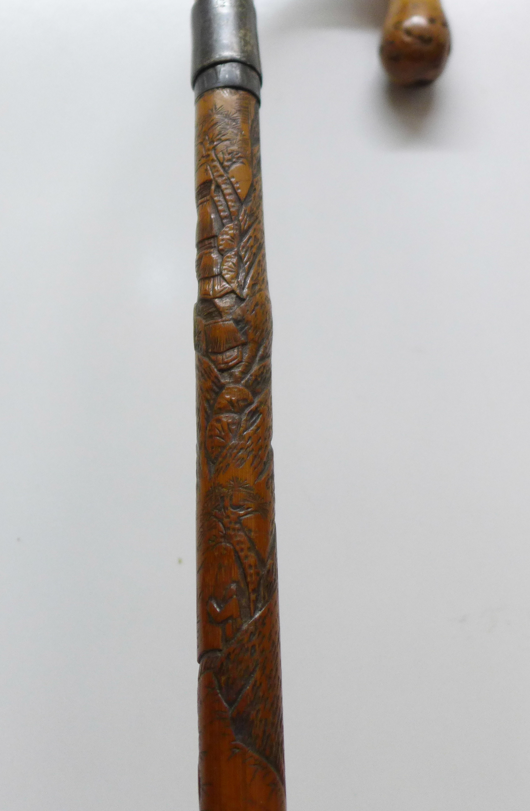 A 19th Century bamboo sword stick with oriental carved decoration and triangular blade, length 72. - Image 4 of 5