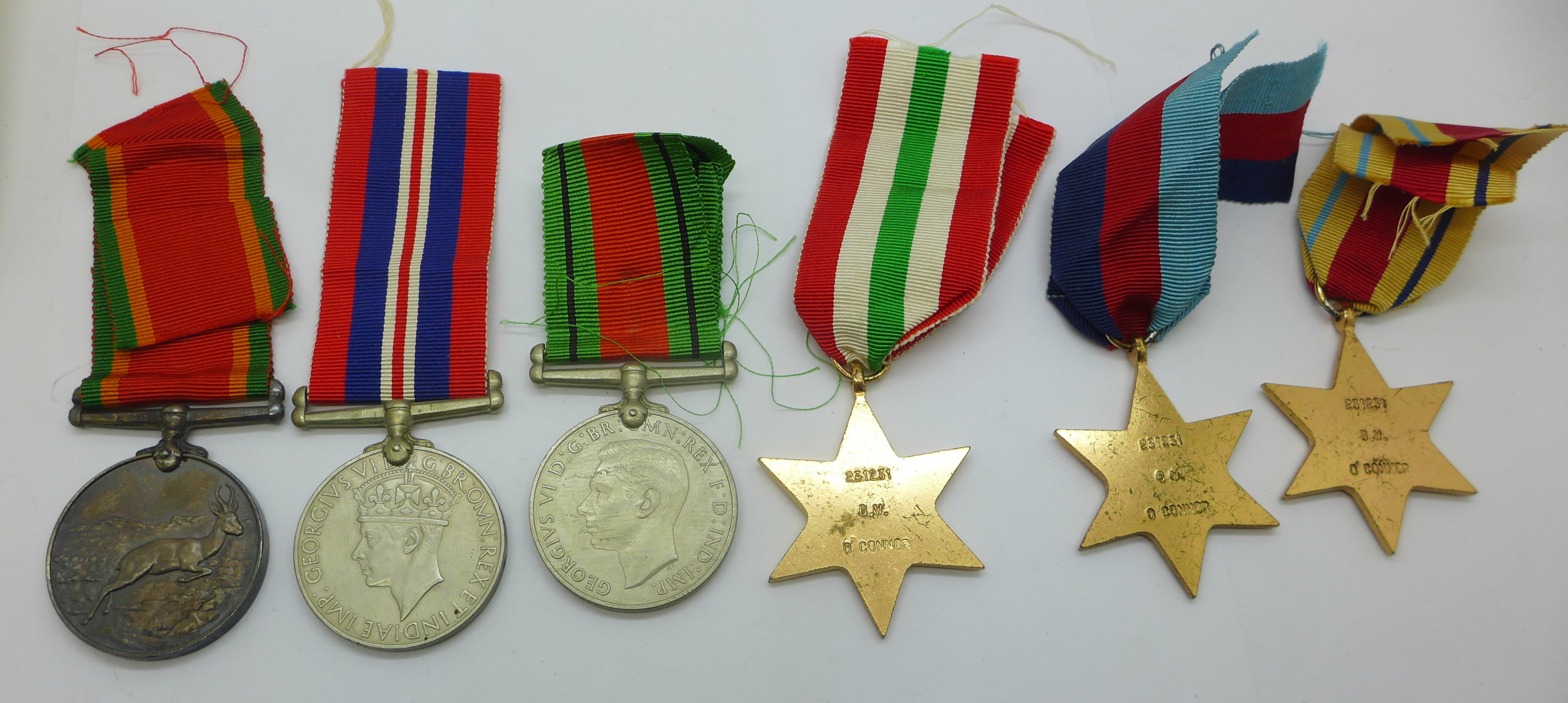 A set of six WWII medals including Africa Service Medal to 231231 D. W. O'Connor with original - Image 6 of 7