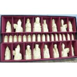 A replica Lewis chessmen set, boxed