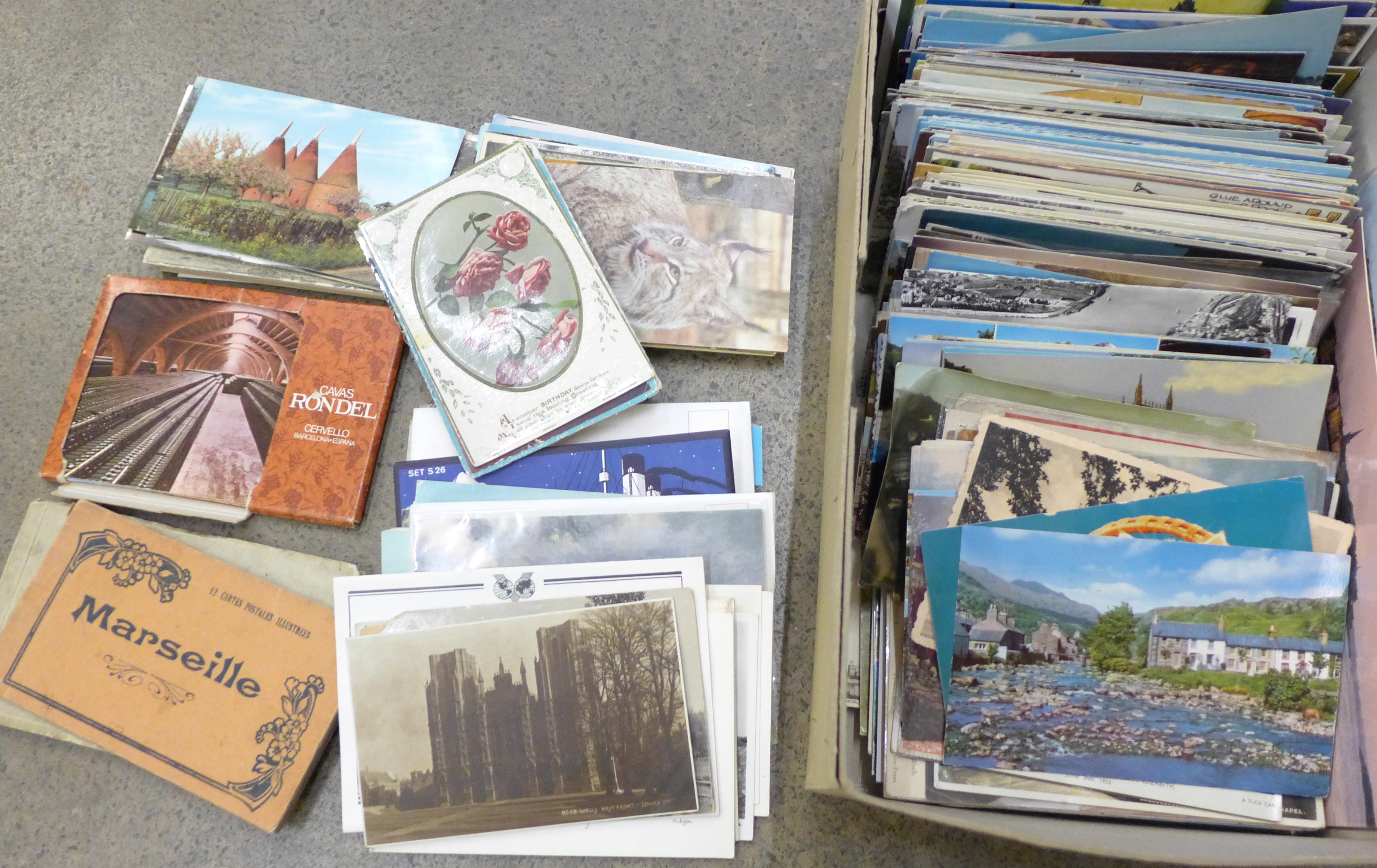 A collection of postcards, vintage to modern