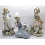 Three Lladro figures, tallest 22cm