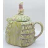 A Ye Daintee Ladyee Crinoline teapot, circa 1930