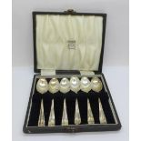 A set of six silver spoons, cased, 53g