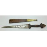 An early 20th Century African dagger with a worked leather handle and leather and snakeskin