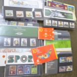 A collection of over 100 Royal Mail mint stamp presentation packs