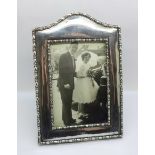 A silver photograph frame, Sheffield 1916, height 19.5cm