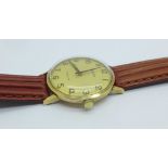 A gentleman's 9ct gold Bulova Longchamp wind-up wristwatch, 32mm case