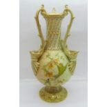 A Worcester Royal China Works blush ivory three handled vase, 698-G, 20cm, a/f