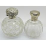 Two silver topped globular glass scent bottles, one with inner stopper, London 1898 and 1917, one