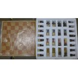 A resin animal chess set **PLEASE NOTE THIS LOT IS NOT ELIGIBLE FOR POSTING AND PACKING**