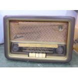 A Bush Bakelite radio, type VHF61