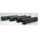 Four Hornby and Tri-ang green OO gauge railway carriages