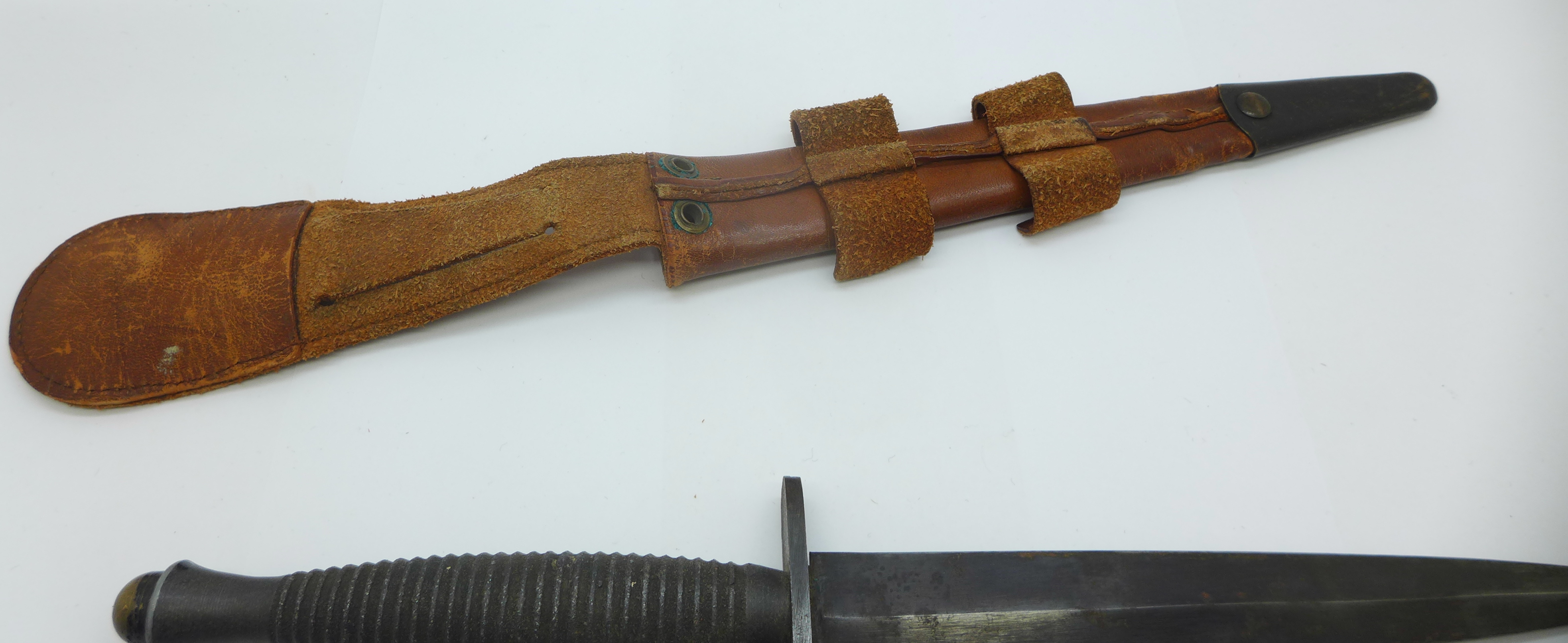 A commando knife with scabbard, tip of blade a/f - Image 4 of 4
