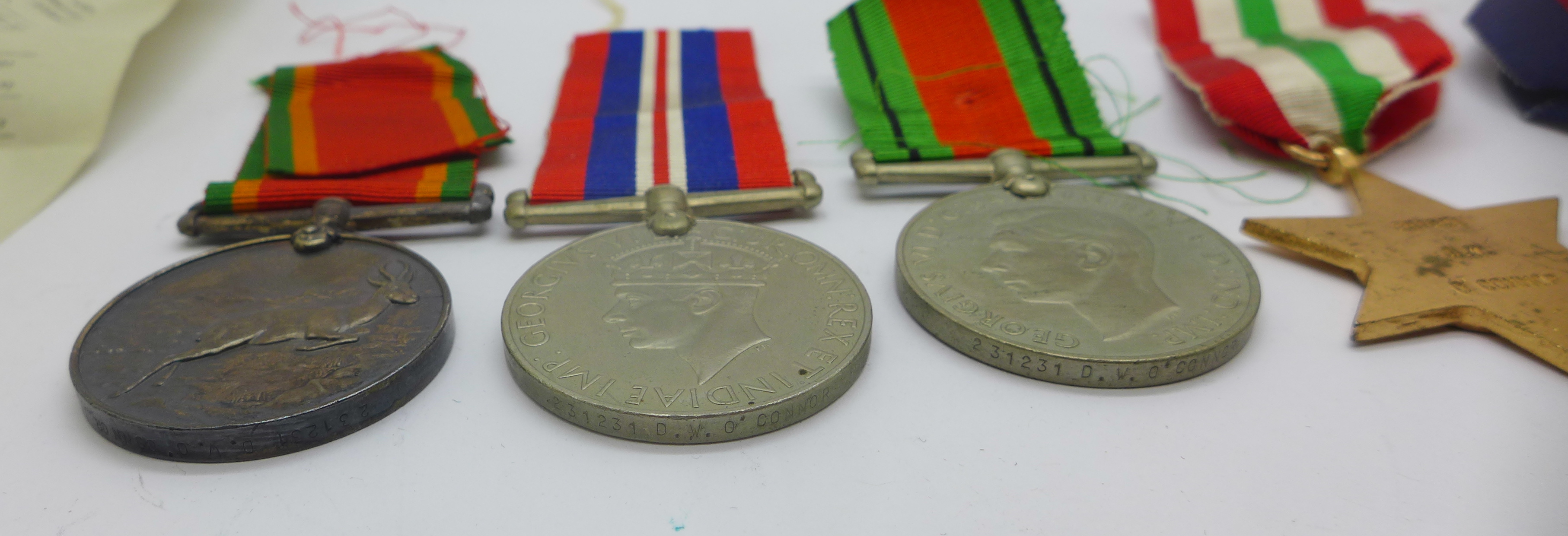 A set of six WWII medals including Africa Service Medal to 231231 D. W. O'Connor with original - Image 7 of 7