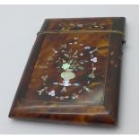 A tortoiseshell and inlaid mother of pearl card case, 77mm x 105mm, a/f, damage at the hinge