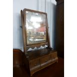 A George I walnut three drawer toilet mirror and a George III mahogany framed mirror