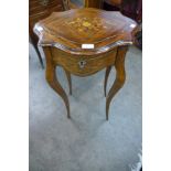 A 19th Century French rosewood and floral marquetry inlaid gueridon table