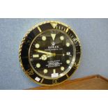 A Rolex dealers display style wall clock