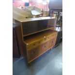 A carved oak linenfold panel highboard