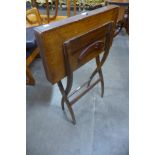 A Victorian mahogany folding coaching table