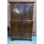 A George III mahogany four door estate cupboard