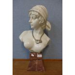 A ceramic bust of a lady