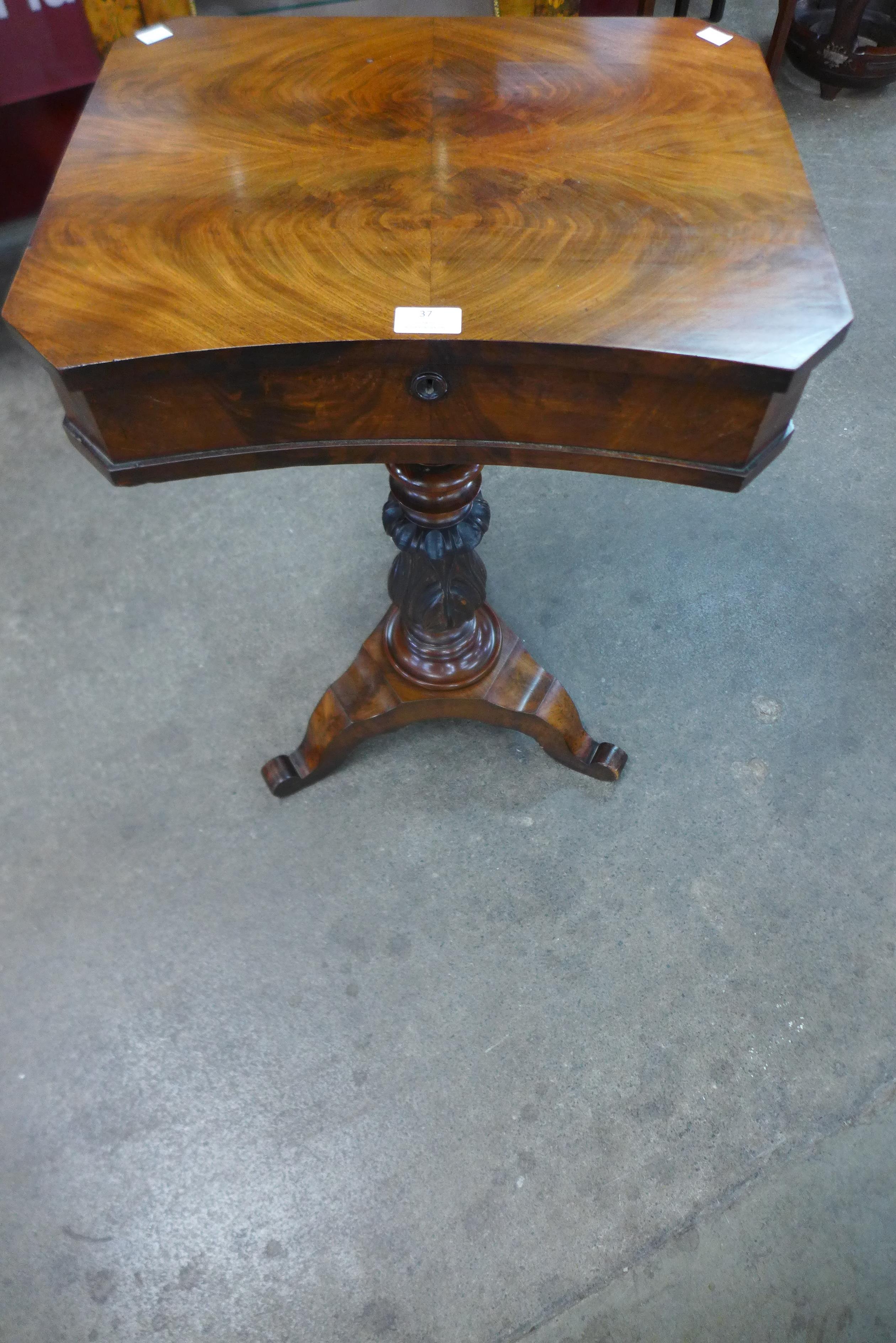 An early Victorian mahogany fitted lady's sewing table