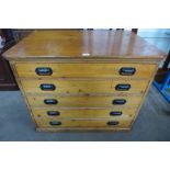 A Victorian pine five drawer plan chest