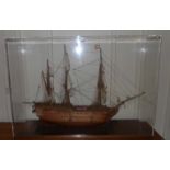 A large cased model of H.M.S. Victory, case dimensions; 93cms h, 132cms w, 38cms d