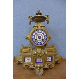 A 19th Century French gilt metal and and Sevres style porcelain mantel clock