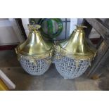 A pair of French Empire style gilt metal and glass chandeliers