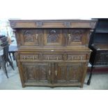 A 17th Century Welsh carved oak cwpwrdd deuddarn