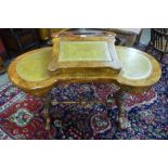 A Victorian inlaid walnut and green leather Davenport top kidney shaped writing table