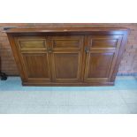 A Victorian walnut three door bookcase