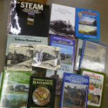 A box of books on locomotives, 7" singles and LP records on the sounds of steam engines