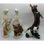 Six Russian china figures of animals, otter, bear, two pandas and two mink